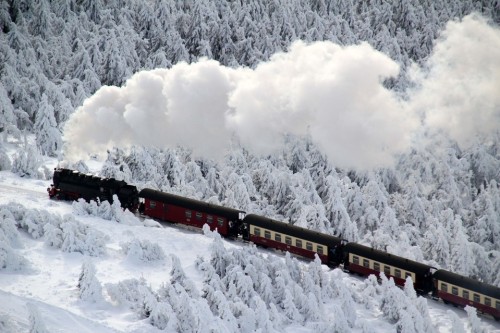 POSTCARD PERFECT A train rolled through a winter landscape with snow-covered trees on the Brocken, the tallest peak in northern Germany’s Harz mountain range, Saturday. (Stefan RampfelDPAZuma Press)
